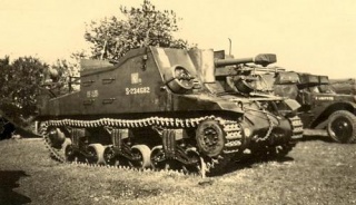 320px-A_Sexton_SP_and_a_variation_of_a_M3_or_M5_halftrack.jpg