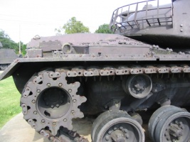 This_tank_lacks_the_track_tensioning_idler_wheel_found_on_the_earlier_Patton_tanks._The_number_of_track_return_rollers_has_also_been_reduced_to_three..jpg