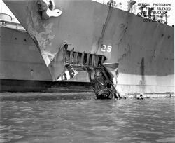 USS_Chicago_torpedo_damage_1942.jpg